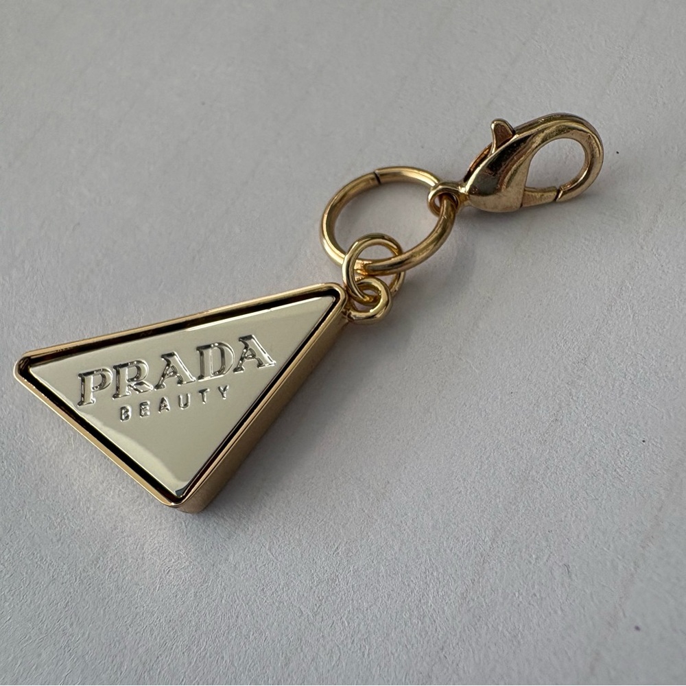 Prada Gold Triangle Logo Charm with Cream Enamel - Picture 8 of 9